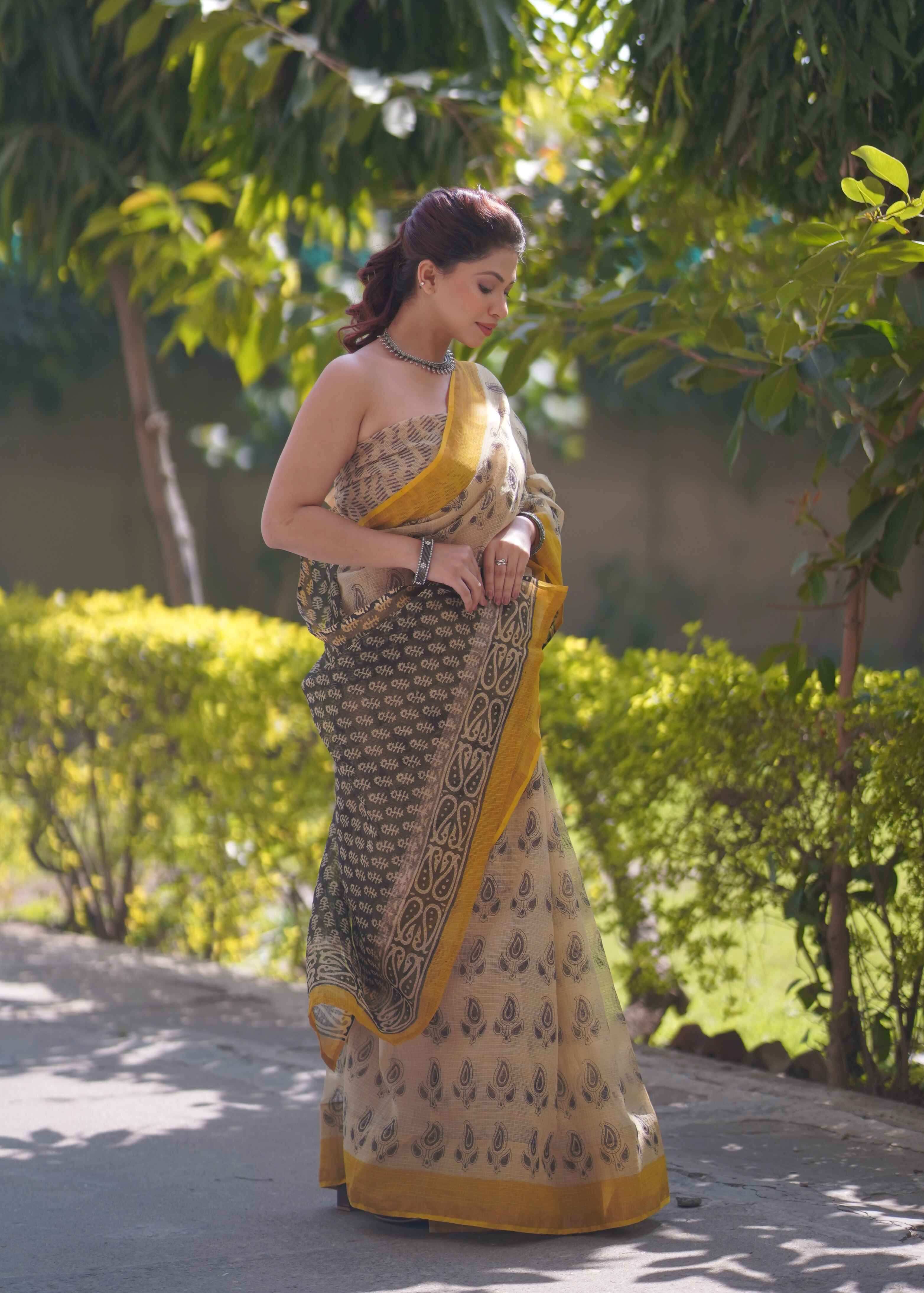 Pankhudi- Cream Saree with Yellow Border