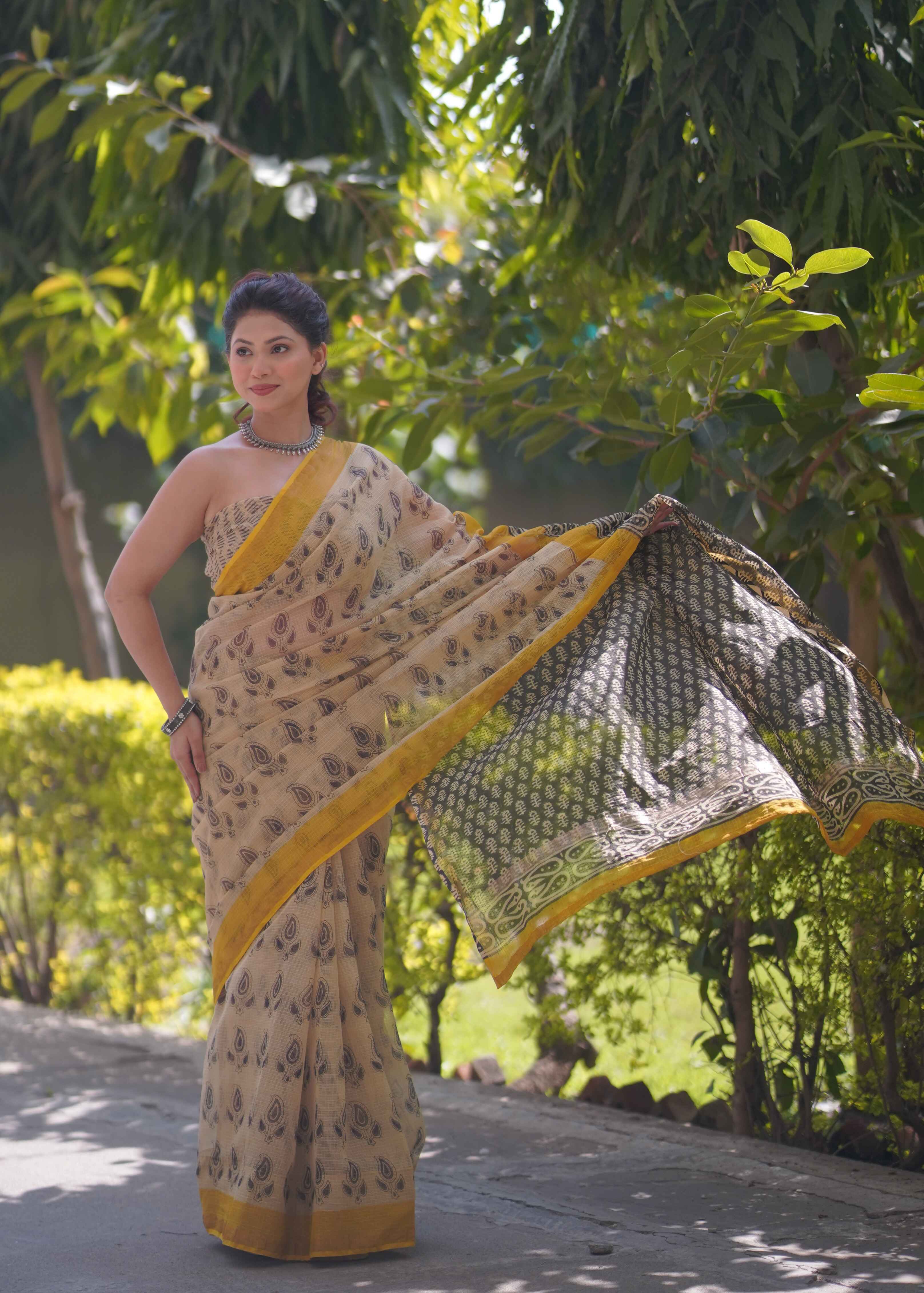 Pankhudi- Cream Saree with Yellow Border