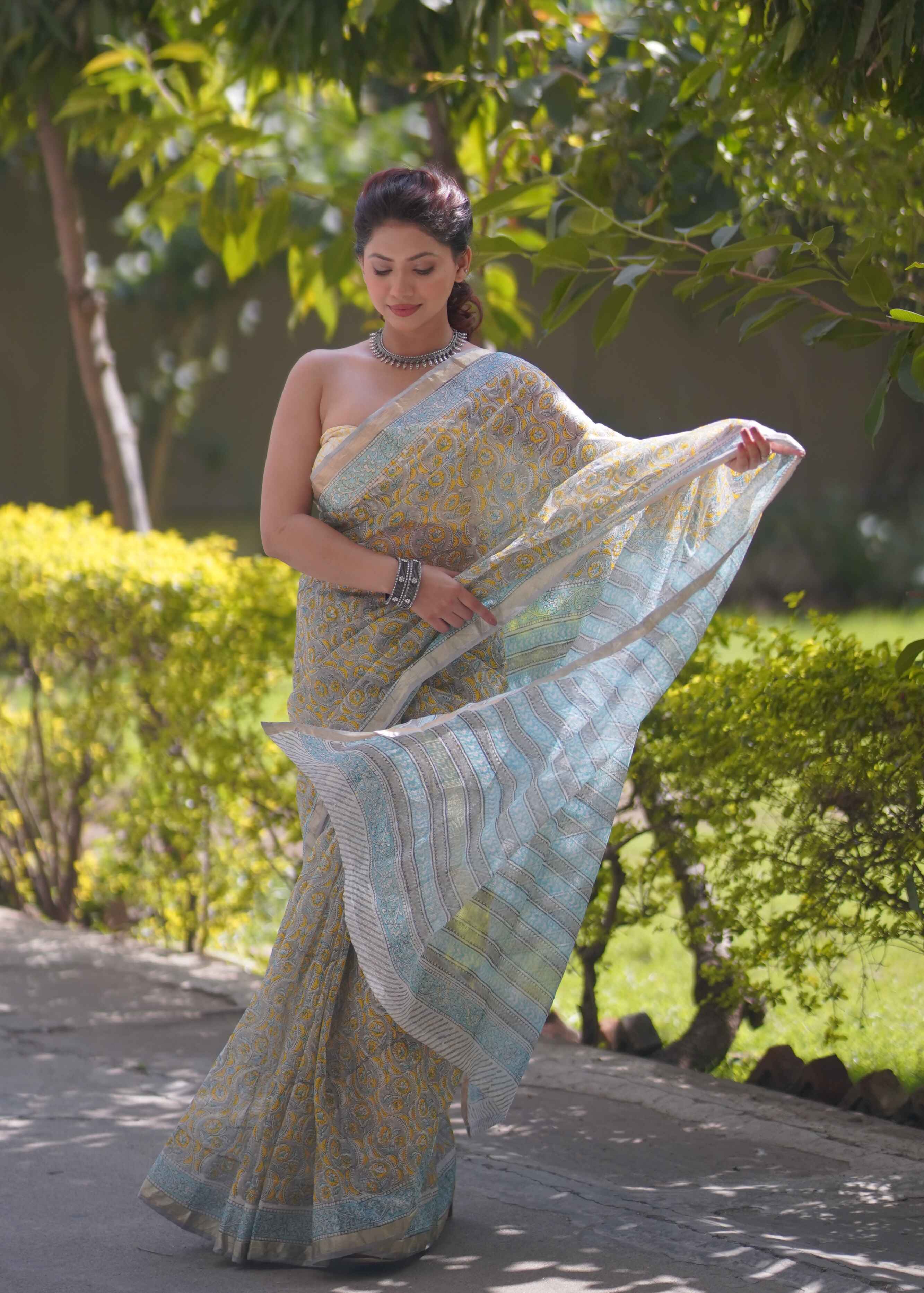 Raangika- Yellow Floral Kota Doria Saree