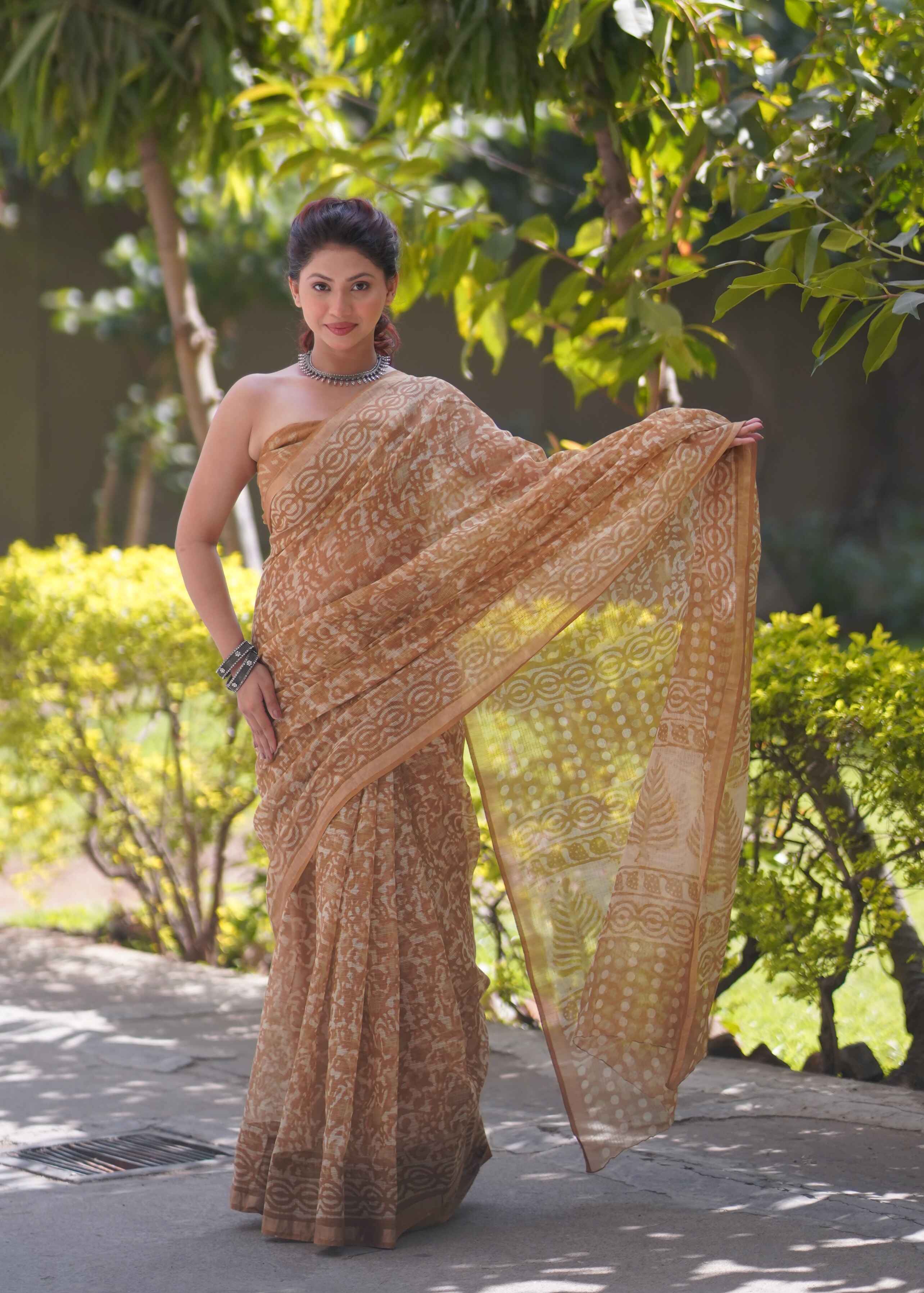 Patangini - Brown Floral Kota Doria Saree